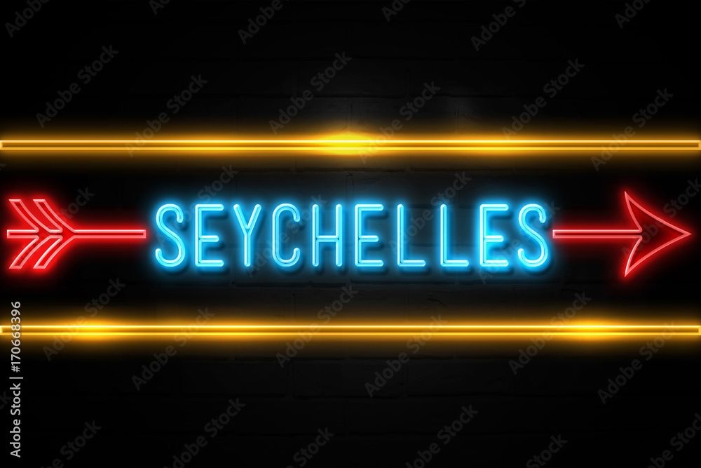 Obraz premium Seychelles - fluorescent Neon Sign on brickwall Front view