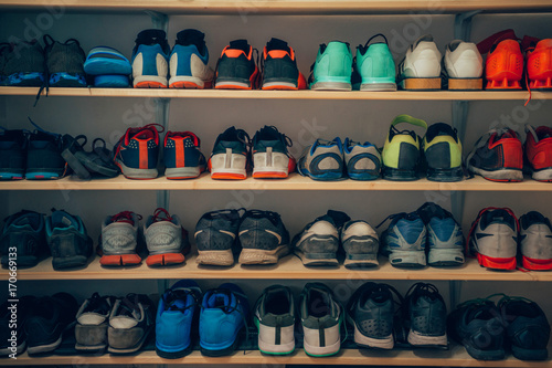 Athletic Shoes on a Shelf at the Gym