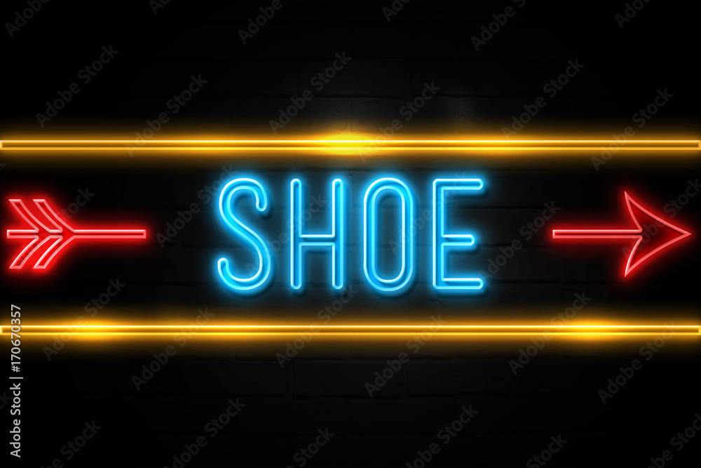 Obraz premium Shoe - fluorescent Neon Sign on brickwall Front view