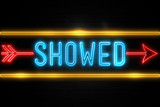 Showed  - fluorescent Neon Sign on brickwall Front view