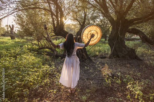 Shaman woman hands wide spread
