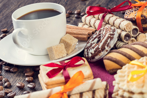 Assorted cookies and cup of coffee
