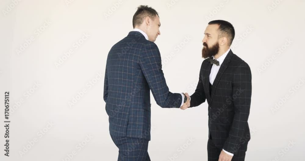 Two business partner shake hands when meeting. Two business partner shake hands when meeting.