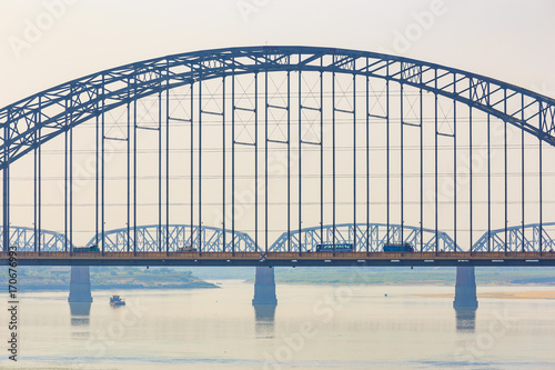 Close-up shot Yadanarbon bridge at Irrawaddy River, Modern bridge in Mandalay Myanma Burma photo