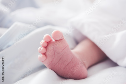 close up of new born baby feet.hight key process