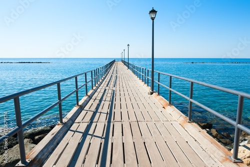 Wooden pier on the seacoast in Limassol, Cyprus © smallredgirl