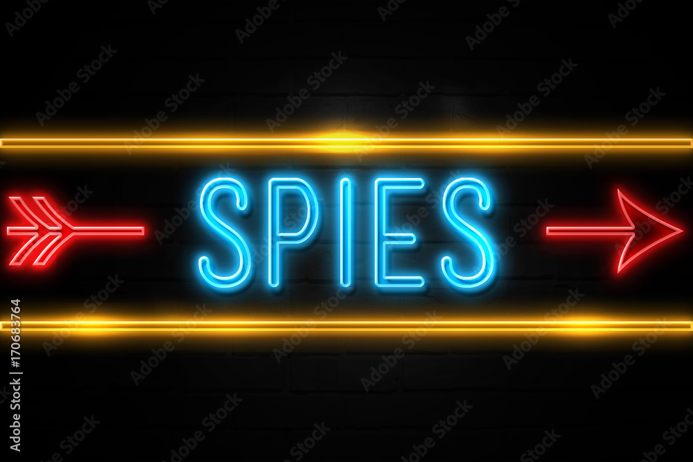 Spies - fluorescent Neon Sign on brickwall Front view Spies - fluorescent Neon Sign on brickwall Front view