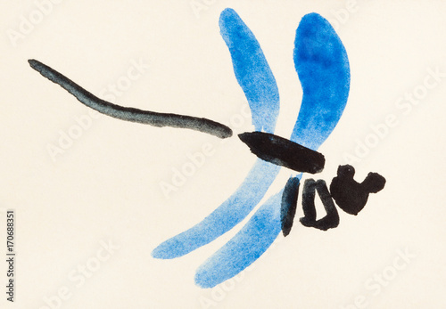 flying dragonfly with blue wings on colored paper