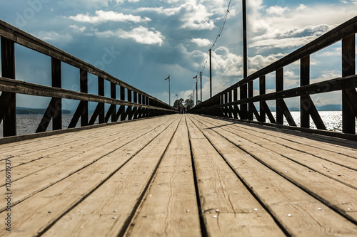 Wooden boardwalk in Rattvik, Sweden, low angle, diminishing perspective photo
