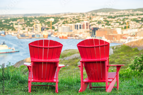 Panorama of St. John's with two characteristic red chairs, Newfoundland, Canada