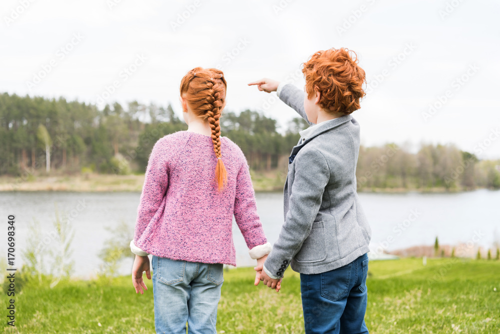 siblings holding hands