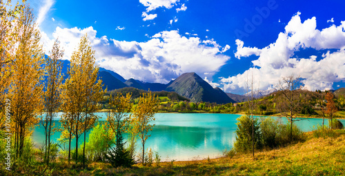 Beautiful autumn landscape with turquoise lake Lago di Castel San Vincenzo in Molise, Italy photo