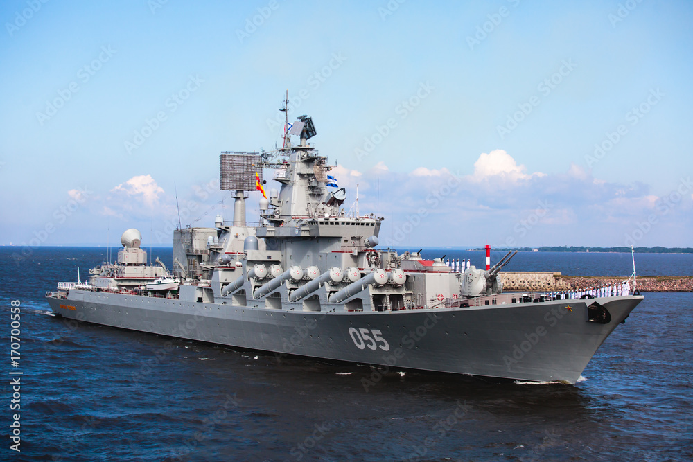 A line of modern russian military naval battleships warships in the row, northern fleet and baltic sea fleet in the open sea A line of modern russian military naval battleships warships in the row, northern fleet and baltic sea fleet in the open sea