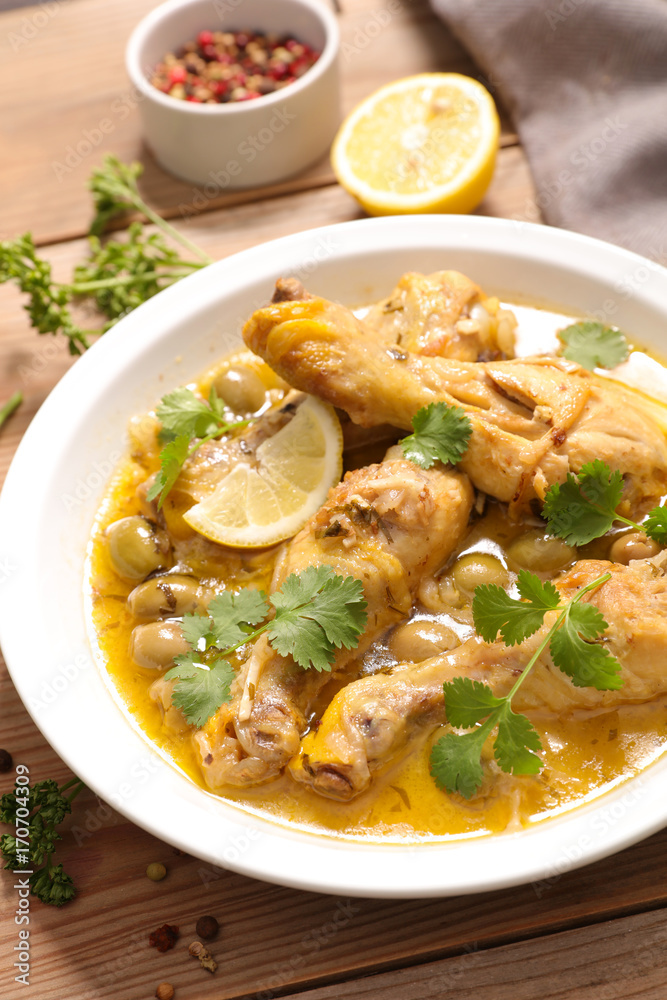 chicken leg cooked with lemon,coriander and olive chicken leg cooked with lemon,coriander and olive
