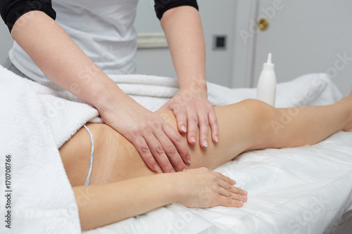 Female Enjoying Relaxing Back Massage In Cosmetology Spa Centre