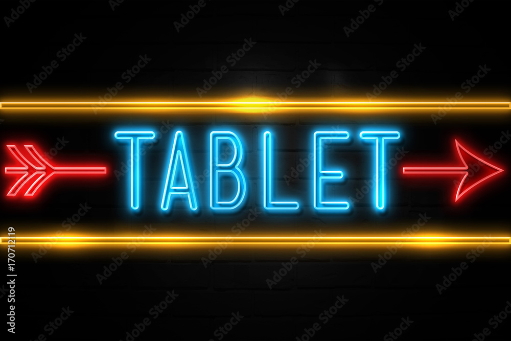Obraz premium Tablet - fluorescent Neon Sign on brickwall Front view