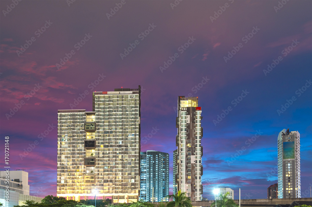 Night cityscape of high apartment for rent in Bangkok, Thailand