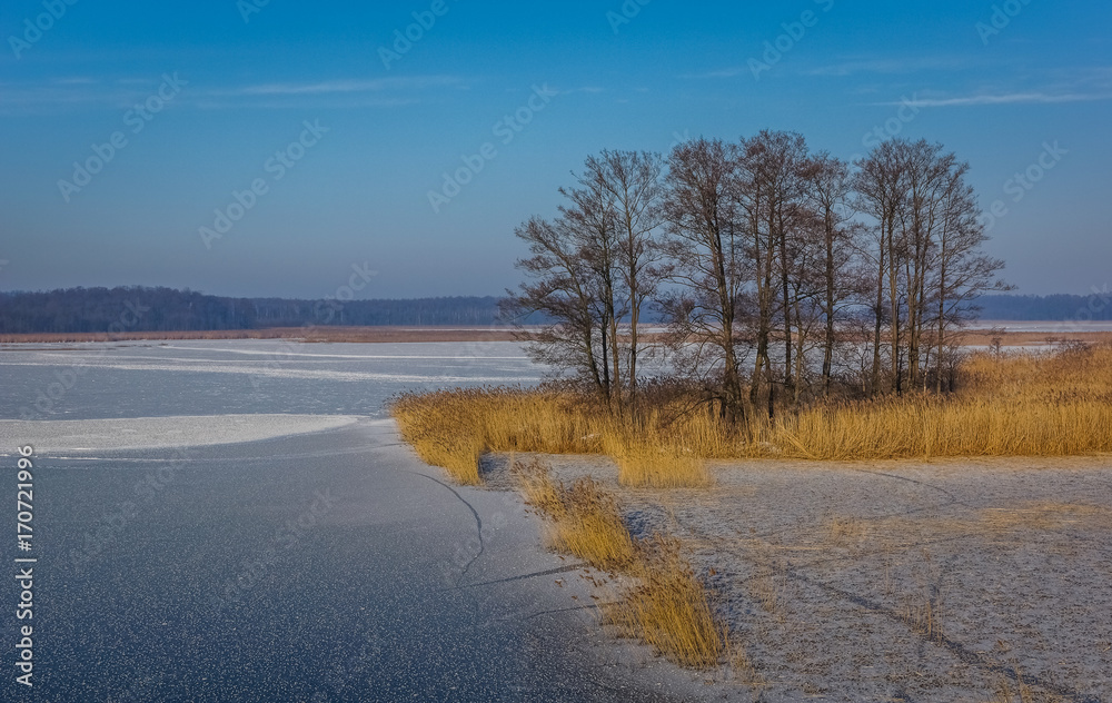 Frozen lake Kirsajty on Masuria, Poland Frozen lake Kirsajty on Masuria, Poland