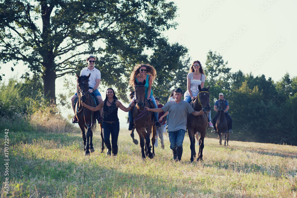 Friends Horseback Riding in the Countryside Friends Horseback Riding in the Countryside