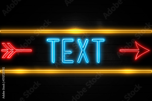 Text - fluorescent Neon Sign on brickwall Front view