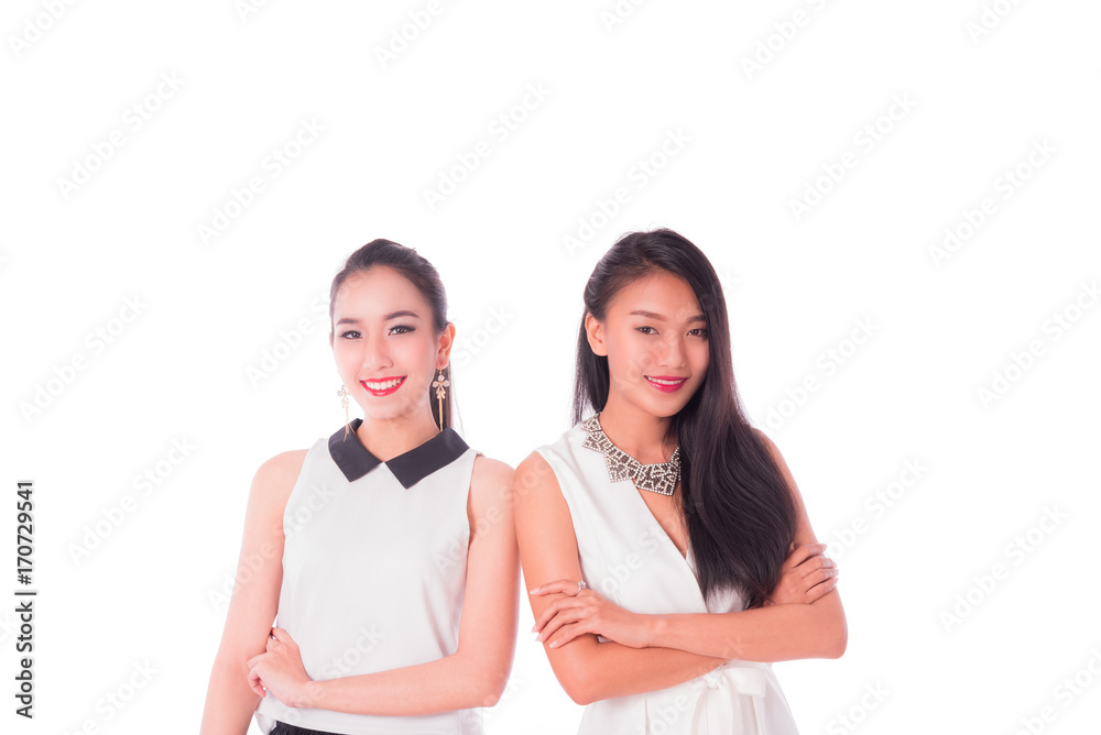 portrait of two attractive caucasian and asian smiling women isolated on white studio , Half body portrait of two attractive caucasian and asian smiling women isolated on white studio , Half body