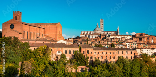 Secenery of Siena, a beautiful medieval in Tuscany, Italy with view of the Dome and Bell Tower of Siena Cathedral 