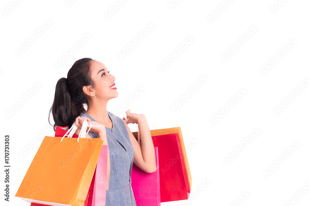 Cheerful shopping woman of Asian holding bags. Shopping smart business woman happy smiling holding colorful shopping bags isolated on white . Fresh young Asian female model Cheerful shopping woman of Asian holding bags. Shopping smart business woman happy smiling holding colorful shopping bags isolated on white . Fresh young Asian female model