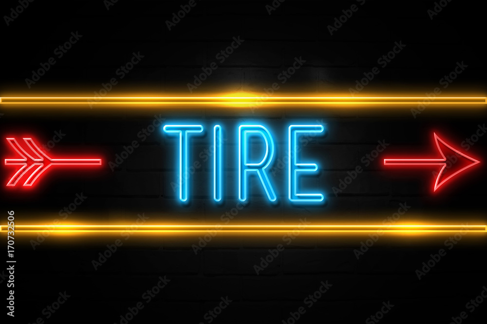 Tire  - fluorescent Neon Sign on brickwall Front view