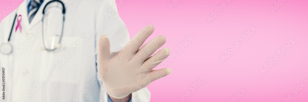 Naklejka premium Composite image of doctor touching an digital screen 