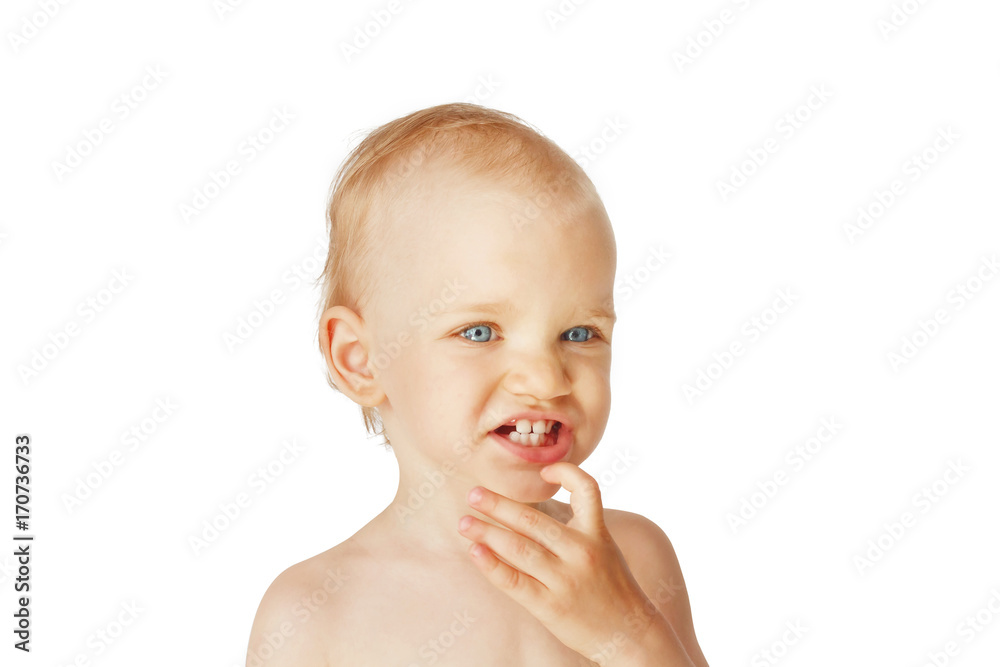 Teething babe portrait. Kid show on a teeth isolated on white background Teething babe portrait. Kid show on a teeth isolated on white background