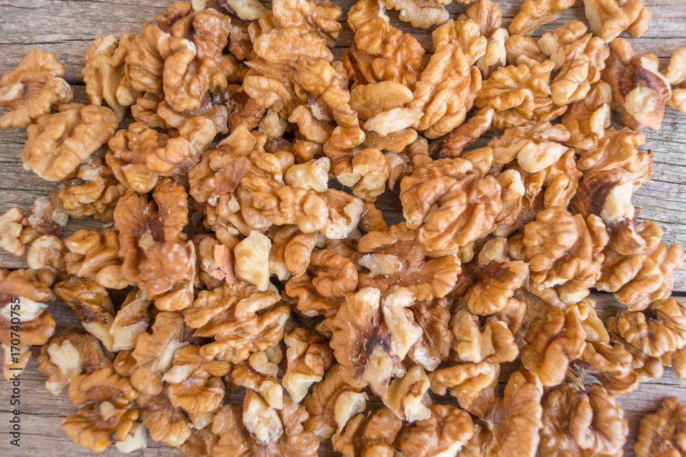 Walnuts on a wooden background, texture Walnuts on a wooden background, texture