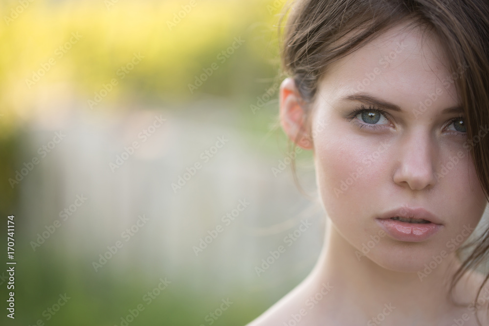 Model with naked shoulders on sunny day Model with naked shoulders on sunny day
