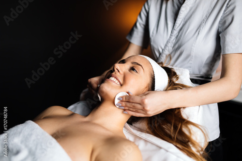 Lovely brunette enjoying massage