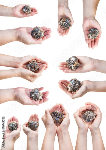 set of various hands with natural mineral ore