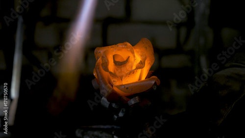 Εκτύπωση καμβά Blacksmith makes an iron rose. Man makes a rose out of iron