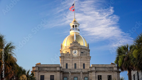 Obraz na płótnie American and Georgia State Flags Fly Atop City Hall in Savannah, Georgia w salonie