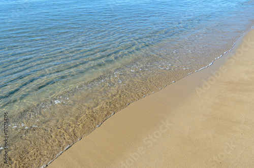 The Black Sea beach with golden sands  blue fresh clear water  bulgarian shore