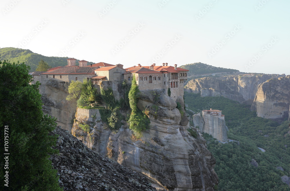 Beautiful landscape of Meteora at sunrise. Monastery of Varlaam. Central Greece.