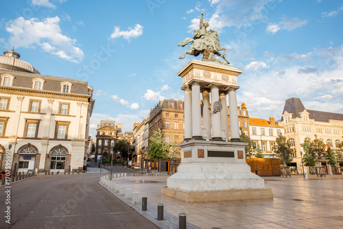View on the Jaude square with statue during the sunset in Clermont-Ferrand city in central France