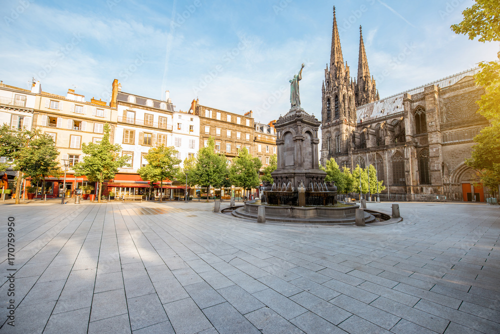 Morning view on the Victory square with monument and cathedral in Clermont-Ferrand city in France - obrazy, fototapety, plakaty 