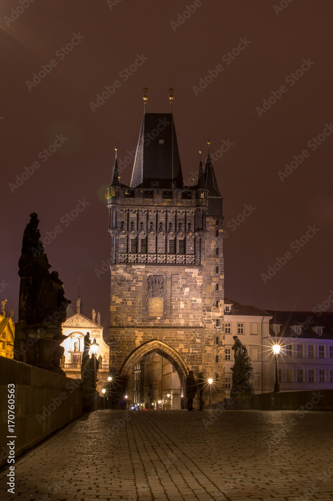 Fototapeta premium Prague, Czech Republic - January 24, 2015. Charles Bridge in Prague at night. Charles Bridge is one of the attractions of Prague.