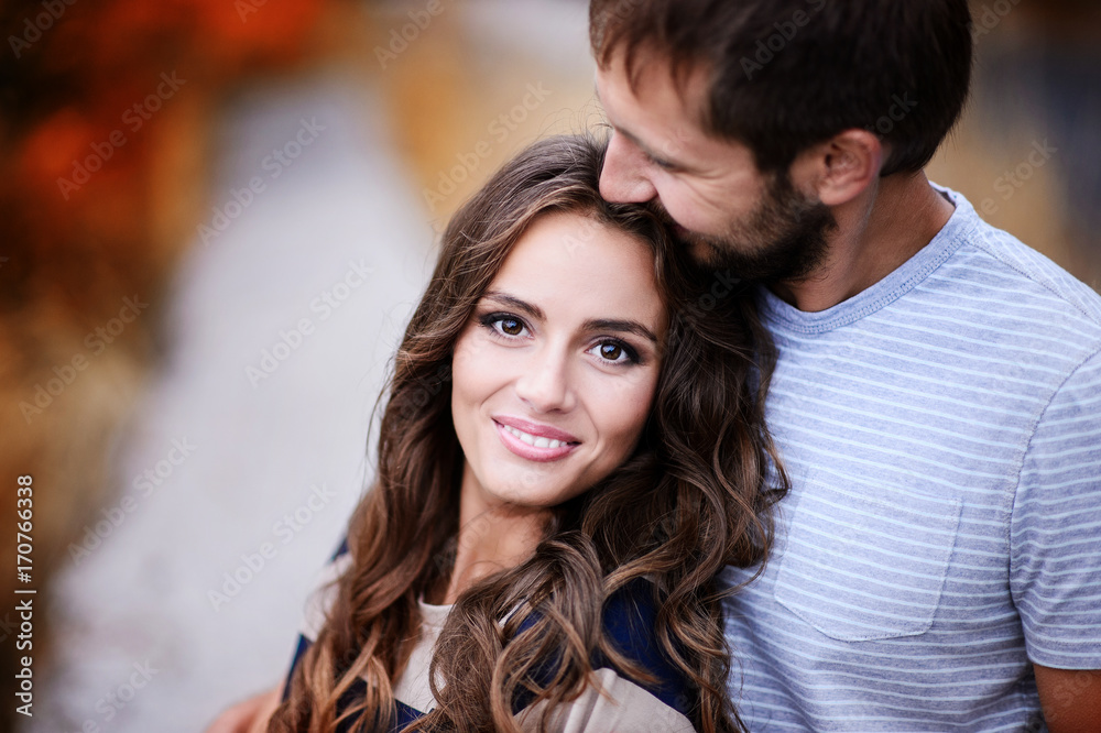Couple in love outdoors. Autumn day.