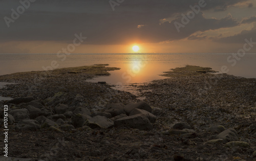 Beautiful sunset Kimmeridge Bay Jurassic Coast Dorset UK photo