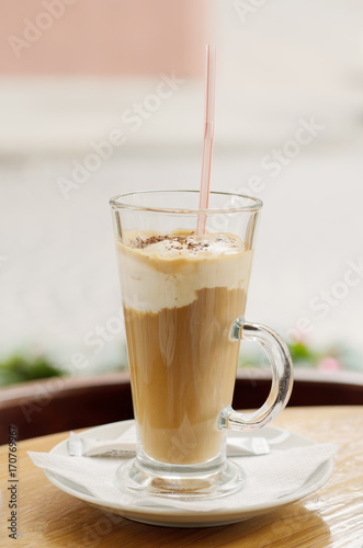 Coffee with cream in a cafe, vintage food background for menu in a cafe