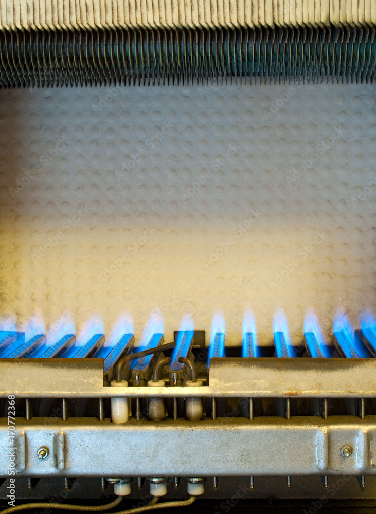 Fototapeta premium Working gas water heater inside.