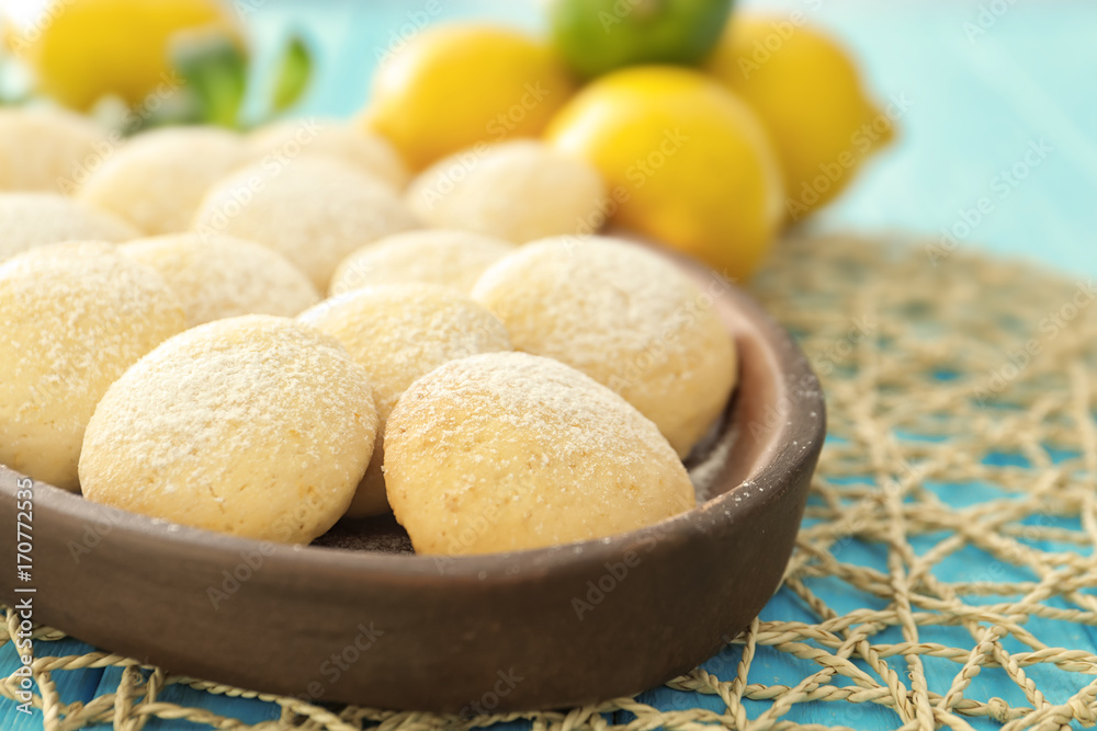 Plate with homemade lemon cookies on table, closeup Plate with homemade lemon cookies on table, closeup