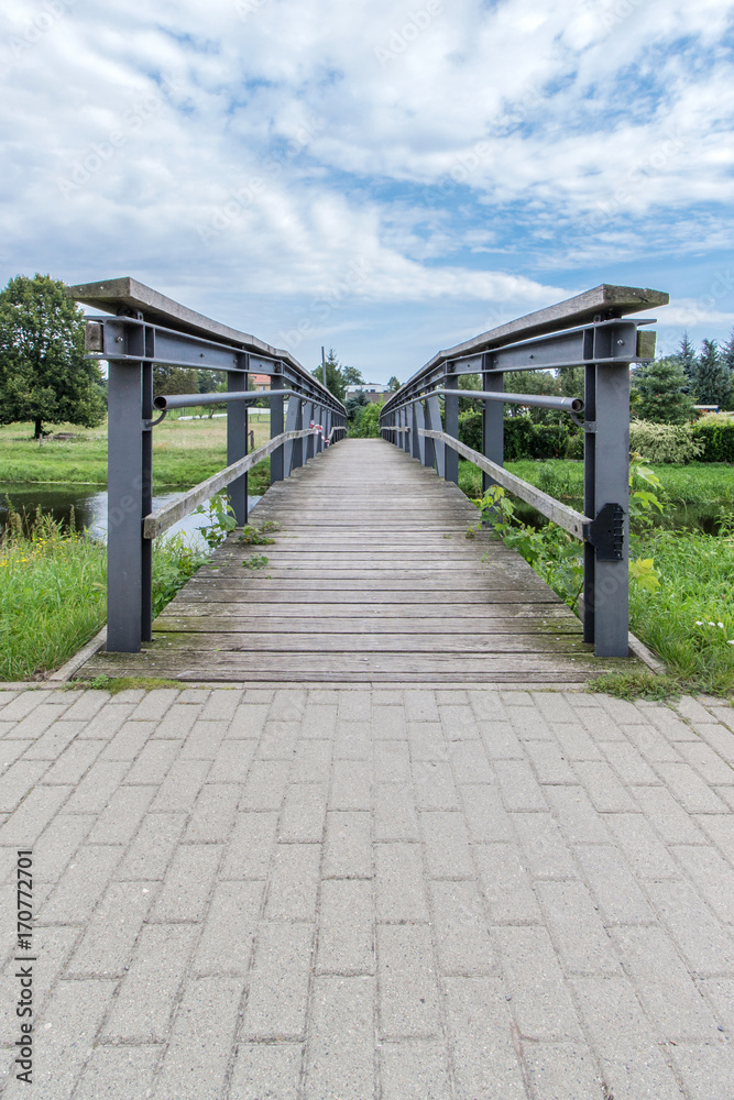 footbridge over a small river
