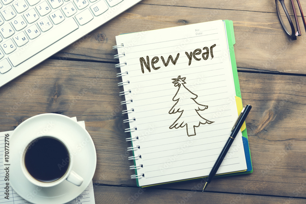 new year text on notepad new year text on notepad