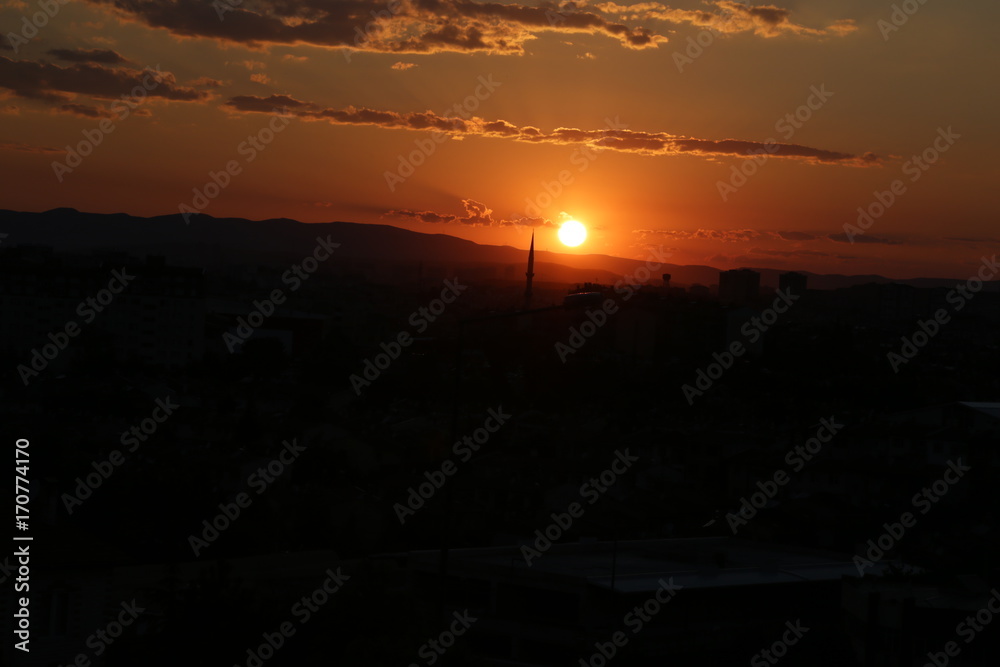 Sunset over Ankara Turkey skies. beautiful landscape with a red sunset sky over the field