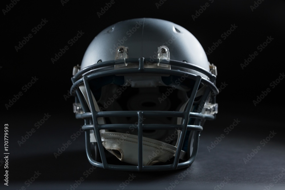 Naklejka premium American football player looking upwards